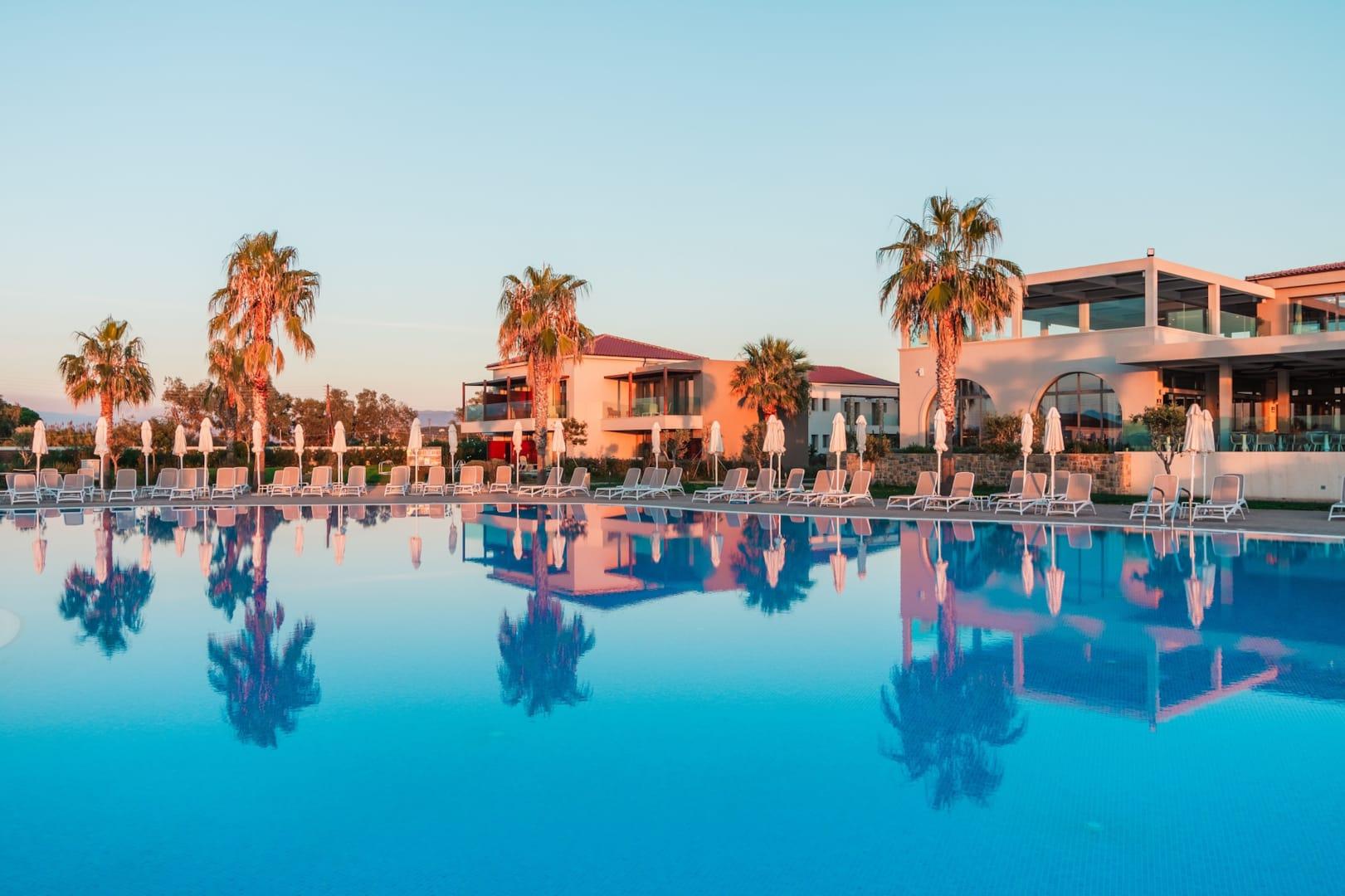 Almyros Beach Альмирос-Бич Экстерьер фото The resort at sunset