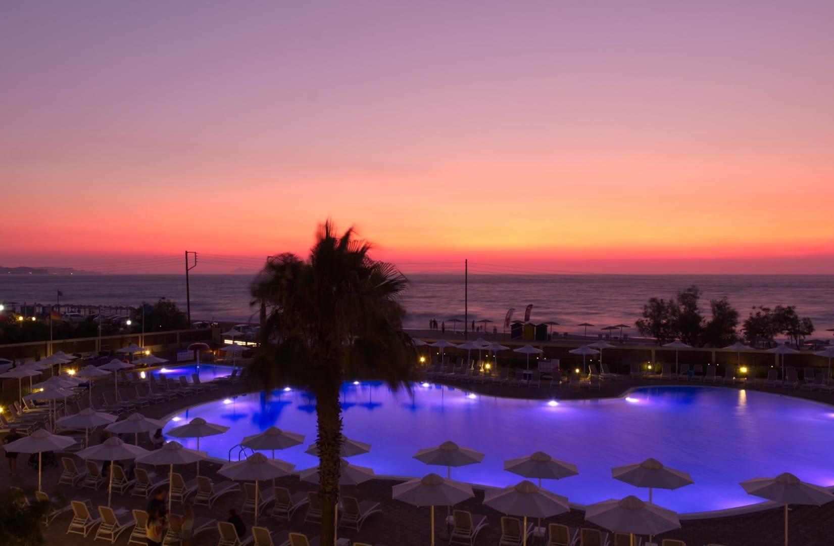 Almyros Beach Альмирос-Бич Экстерьер фото Sunset at a resort in Crete