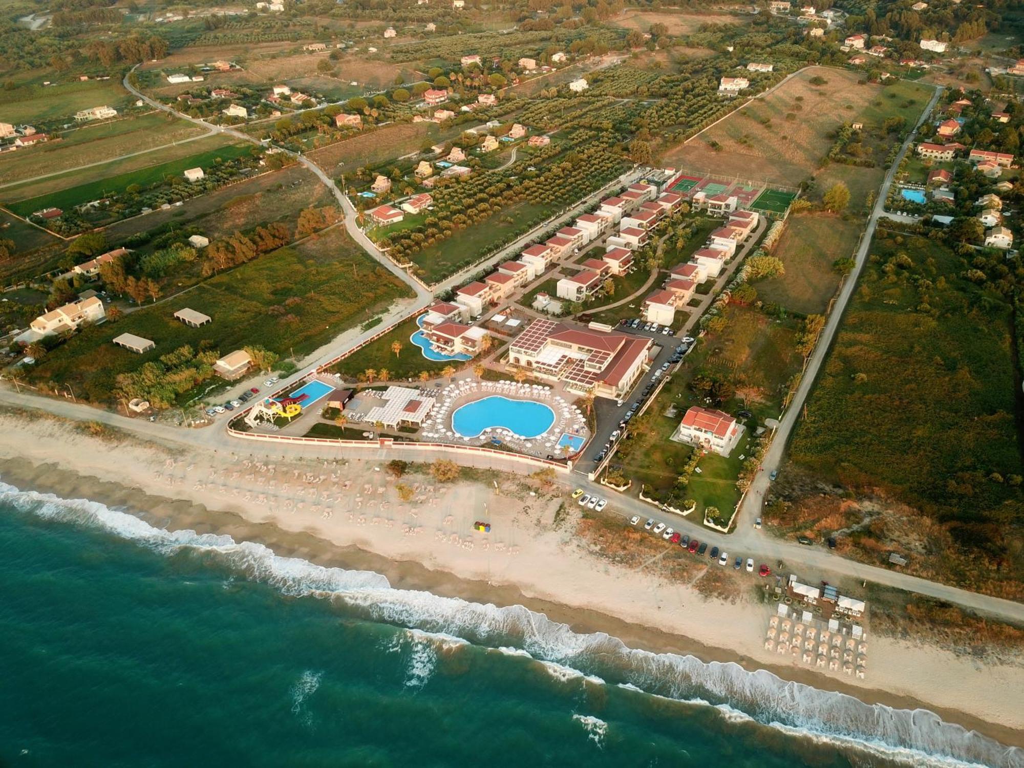 Almyros Beach Альмирос-Бич Экстерьер фото Aerial view of the resort