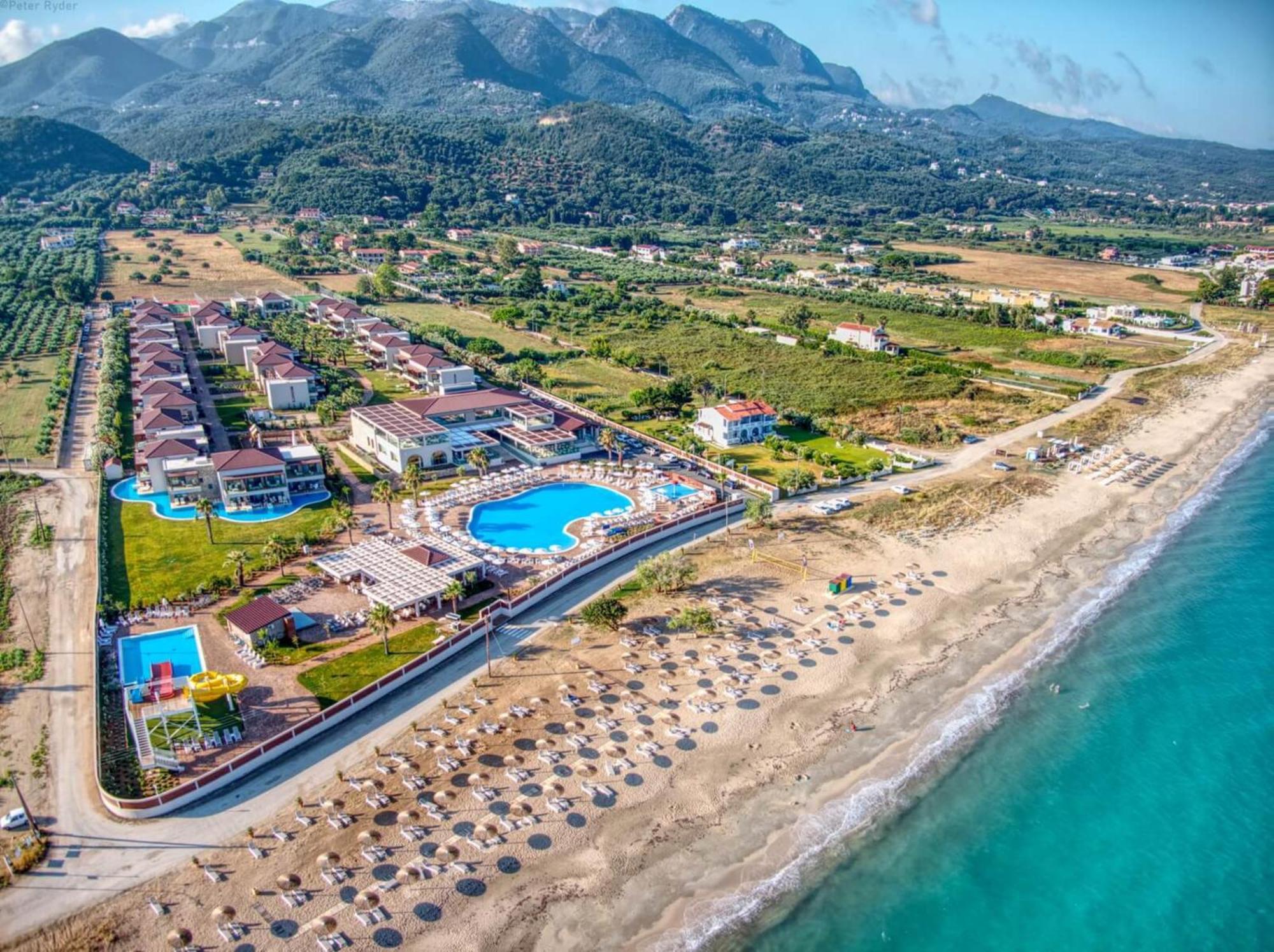 Almyros Beach Альмирос-Бич Экстерьер фото Aerial view of the resort