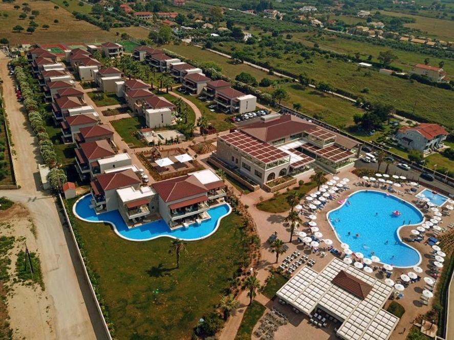 Almyros Beach Альмирос-Бич Экстерьер фото Aerial view of the complex